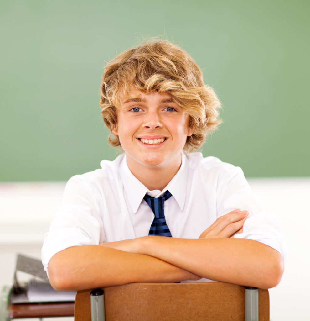 Cute,High,School,Student,Sitting,In,Classroom